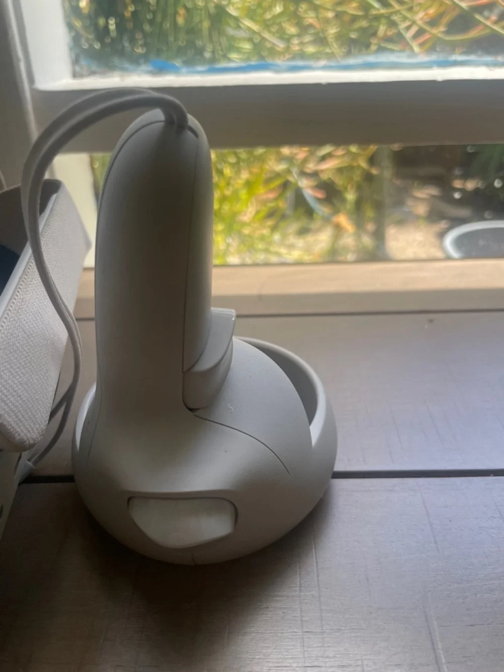 Oculus white standalone VR headset with white controllers and black face gasket